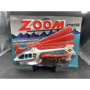 Helicopter ZOOM COPTER Flies Over 100 FT. No Batteries Needed! Item #919 NIP